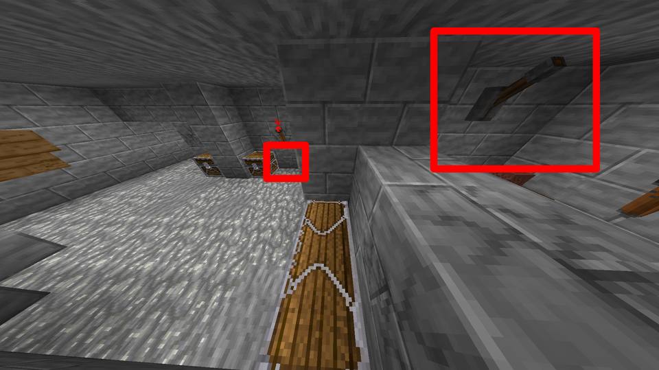 Image 1 — Cave de Gonon : levier derrière le coffre et bouton sous la torche de redstone.